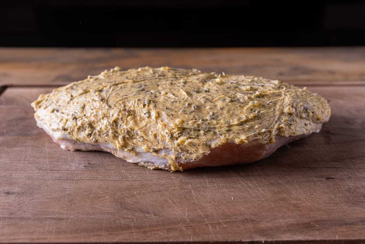 Turkey breast with herb butter ready to be smoked