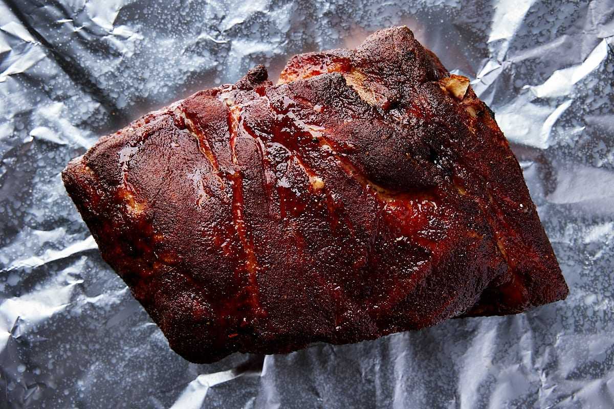Wrap smoked pork butt in aluminum foil