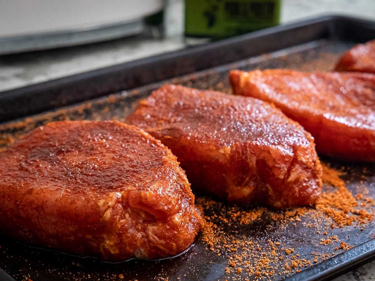 Let seasoning adhere to Traeger pork chops