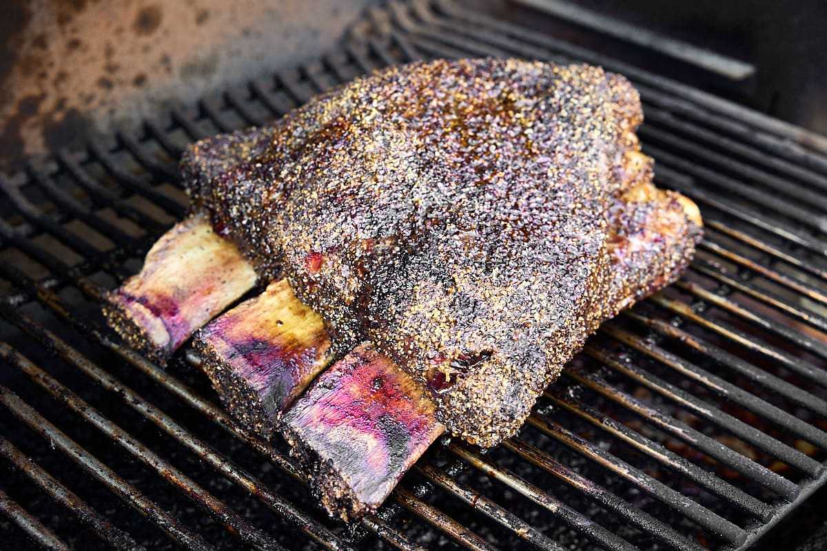 Smoke beef short ribs at 250 degrees fahrenheit